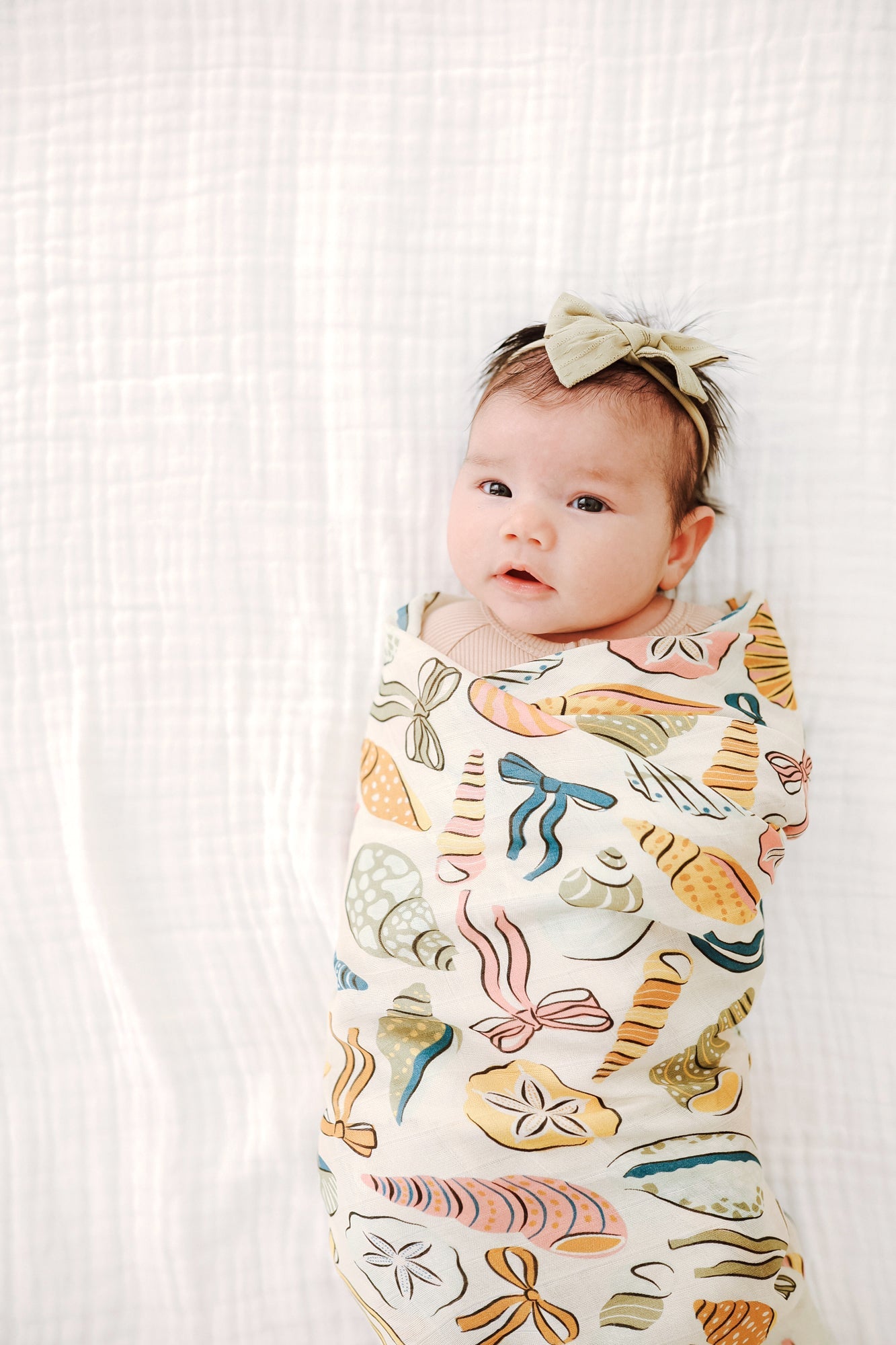 Coastal Bows Muslin Swaddle BlanketMuslin Swaddle BlanketEllie Sue