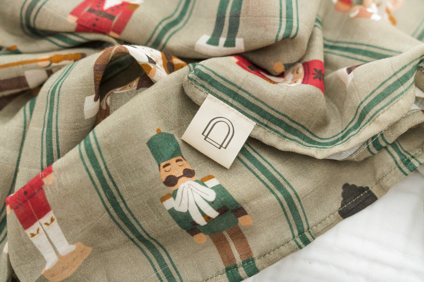 Nutcracker Parade Muslin Swaddle Blanket